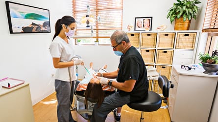 Dr. Staph reviewing treatment with a patient
